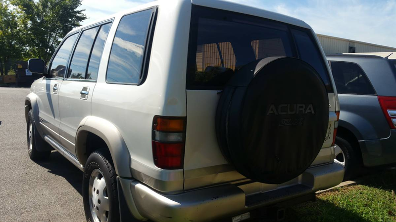 Illustration for article titled For $2,350, Would You Adopt This 1997 Acura SLX Brother From Another Mother?